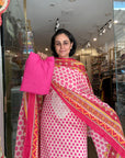 Vibrant Pink Polka Dot Cotton Suit Set with Intricate Border and Matching Bottom